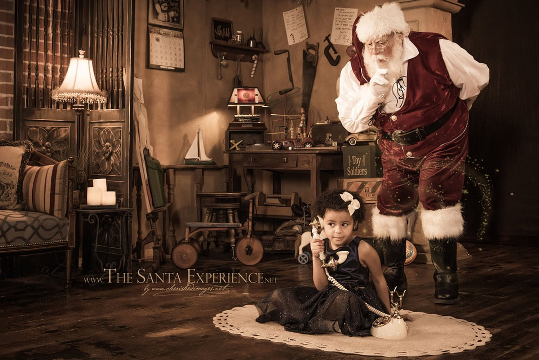 Girl Calling Santa during Cherished Images Professional Santa Pictures Event in Boise